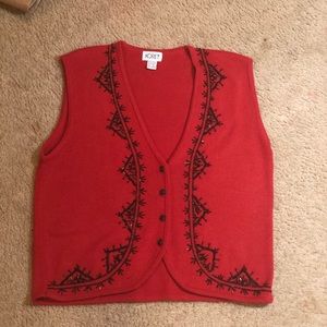 A red Koret sweater vest